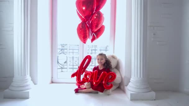 Slow Motion Mischievous Girl Heart Shaped Balloons Valentine Day — Stockvideo