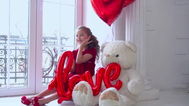 Slow Motion Funny Beautiful Little Girl Red Balloons Window — Video Stock