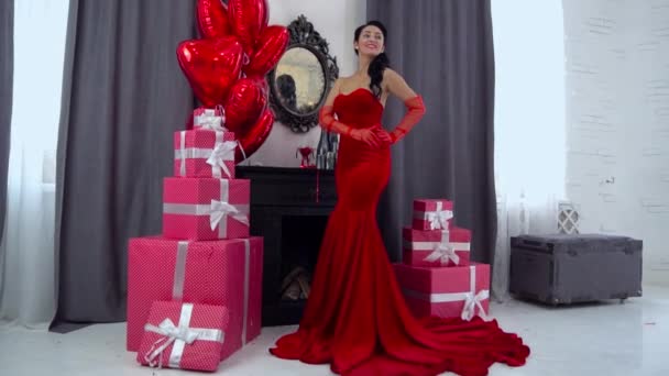 Slow Motion Girl Red Dress Standing Window Heart Shaped Balloons — Vídeo de stock