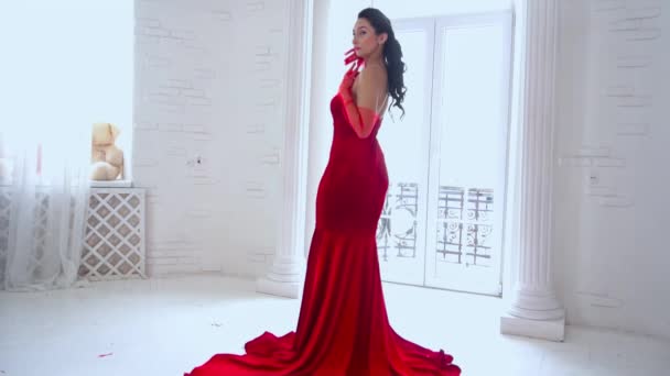 Slow Motion Tractive Woman Red Dress Spacey Room Window — Stockvideo