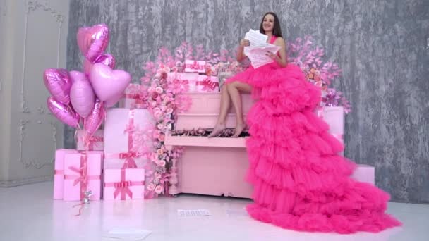 Fashionable Brunette Long Pink Dress Vintage Interior — Stockvideo