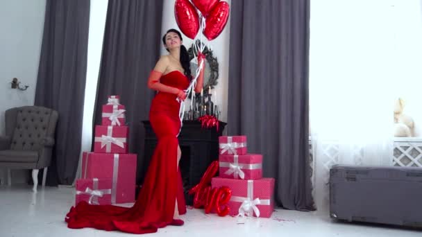 Slow Motion Beautiful Girl Red Dress Balloons Gift Boxes — Stock Video