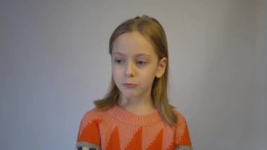 4k Tired overworked blonde little kid girl has sleepy expression