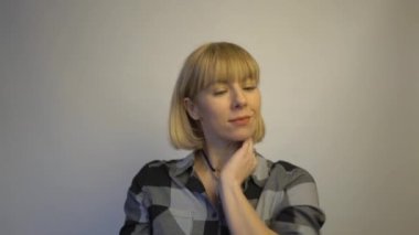 4k Cute mature blond female adult flirting with smile