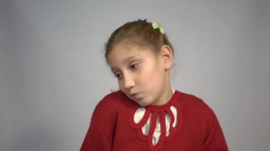 4k Pretty girl hugging her shoulders because she doesn't know the answer