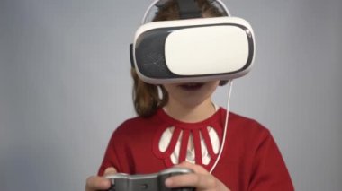 4k Emotional kid exploring artificial computer world or playing video game