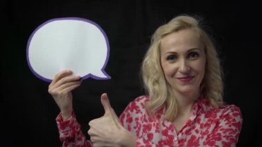 4k Woman holding thinking bubble and pointing finer up idea