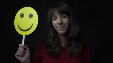 4k Happy woman with smiley emoticon, casual cheerful female posing for happiness