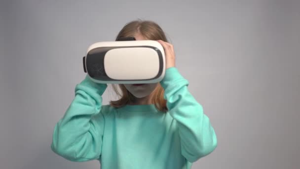 Kid Watching Something Virtual Reality Headset Touching Hand — 图库视频影像