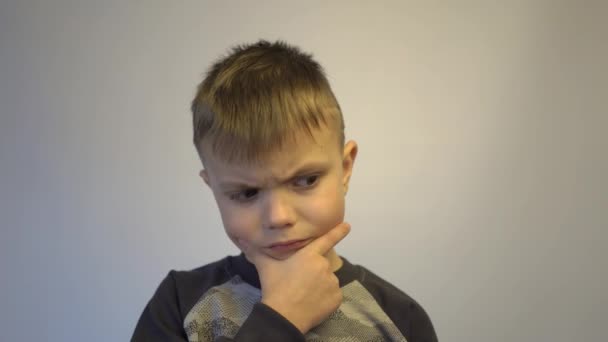 Portrait Cute Boy Thinking Isolated White Background — Stockvideo