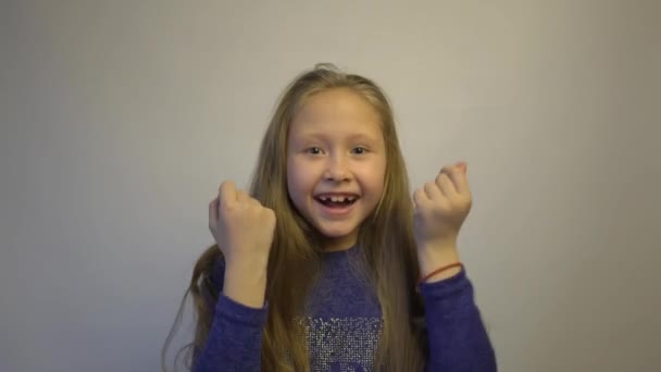 Delighted Positive Little Caucasian Kid Girl Having Great Result — Stockvideo