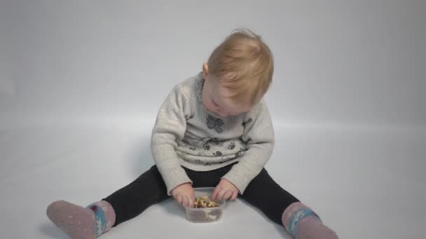 Baby Taking Different Seeds Nuts Dried Apricots Discover Taste — Vídeo de Stock