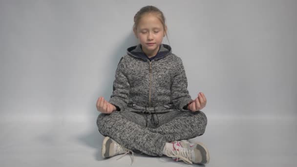 Peaceful Calm Relaxed Young Woman Meditates Keeps Hands Zen Gesture — ストック動画