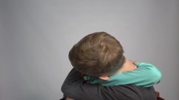 Brother Sister Hugging Gray Background — Vídeos de Stock