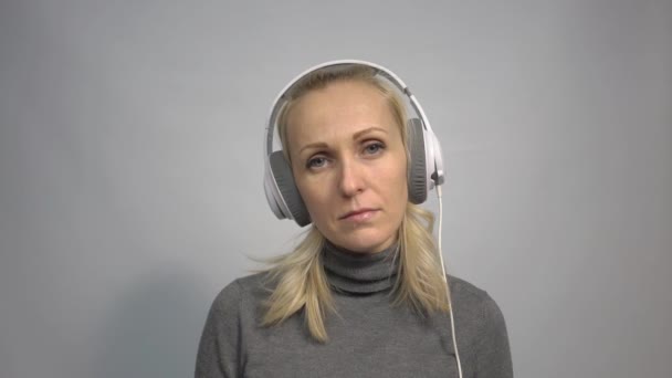 Sad Woman Listens Music Wireless Headphones — Αρχείο Βίντεο