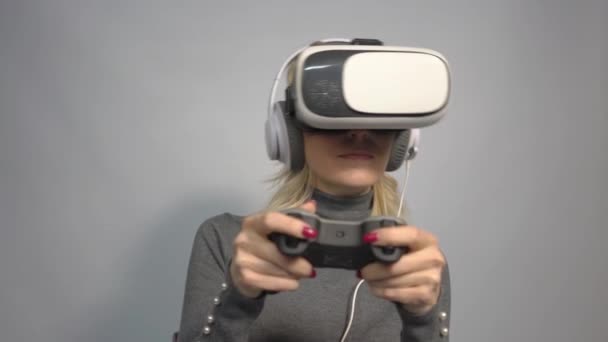 Young Handsome Woman Wearing Virtual Headset Playing Game — Stock video