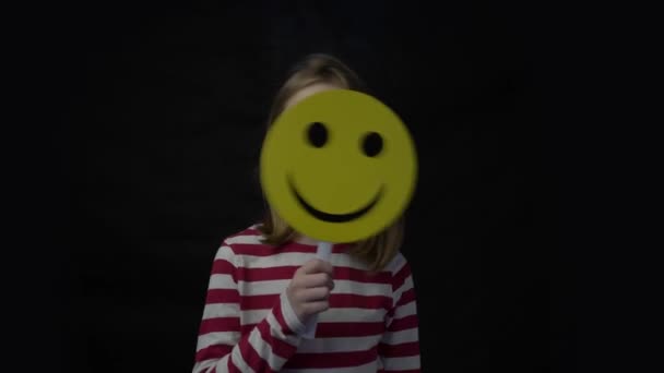 Happy Girl Holding Piece Paper Emoji — Vídeos de Stock