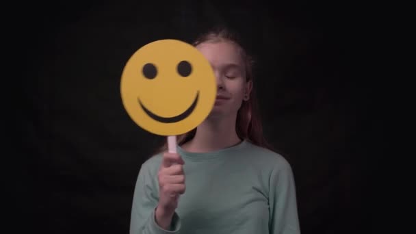 Lady Hold Emoji Smile Cover Face Isolated Black Background — Wideo stockowe