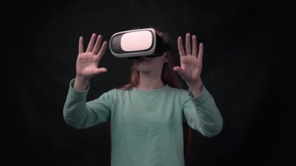 Girl Wearing Virtual Reality Goggles Standing Black Background — Stock Video