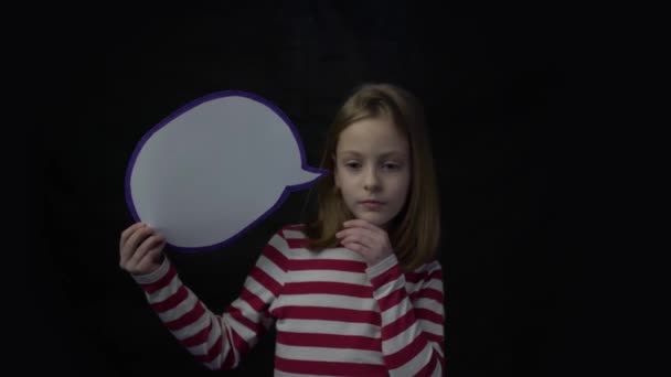 Young Woman Holding Speech Bubble Black Background Thinking — Video