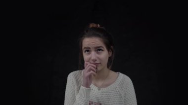 4k Girl twisting mouth trying to remember something. Facial expressions