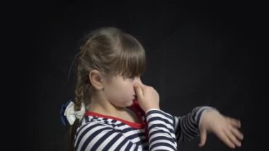 4k Close up kid feeling bad and dislike smell and hold nose from funny odor