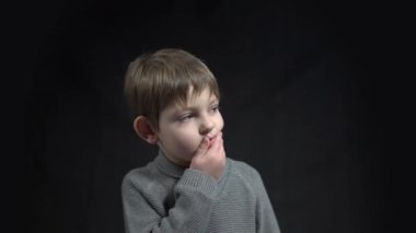4k Kid think or compos on black background