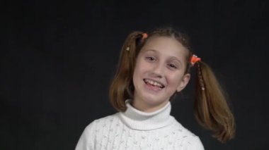 Young girl wearing casual clothes with a happy and cool smile on face.