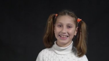 Slow Motion Beautiful and happy girl, isolated over black background