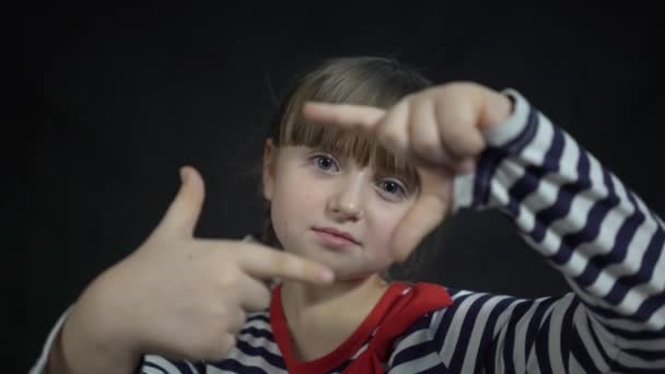 Beautiful Girl Making Frame Gesture Fingers Black Background — Vídeos de Stock