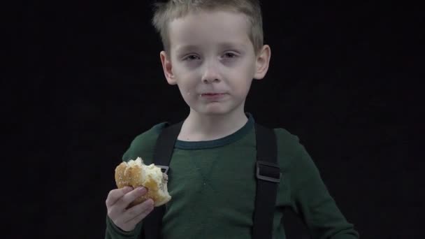 Slow Motion Kid Boy Eating Delicious Hamburger — Stock videók