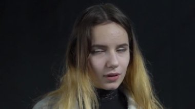 Slow Motion Upset tired, bored ginger girl making face palm gesture, bored