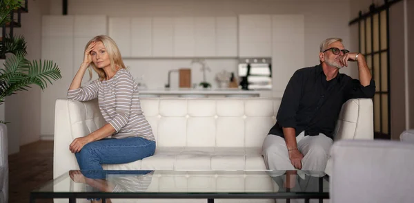 Quarrel Conflict Mature Family Upset Husband Wife Sitting Sides Sofa — Foto de Stock