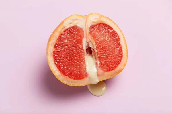 Sexual grapefruit, concept. Vagina and clitoris symbol.