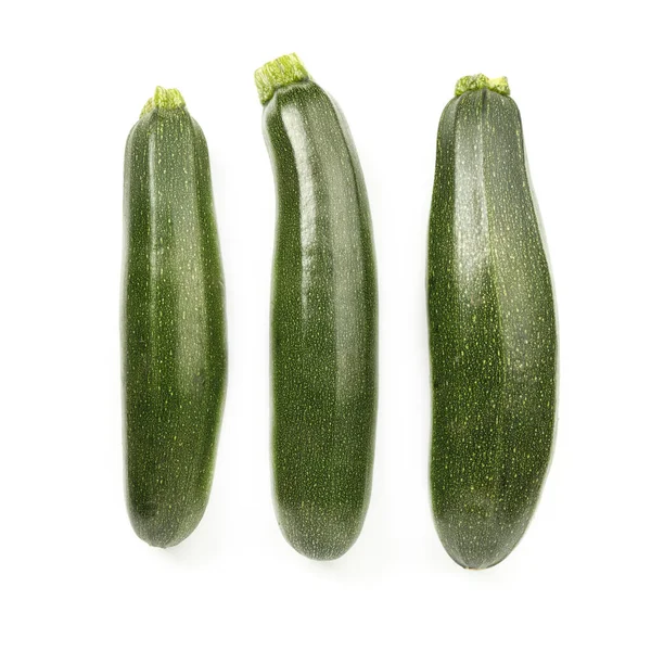 Drie Courgettes Een Witte Achtergrond Groene Groenten — Stockfoto