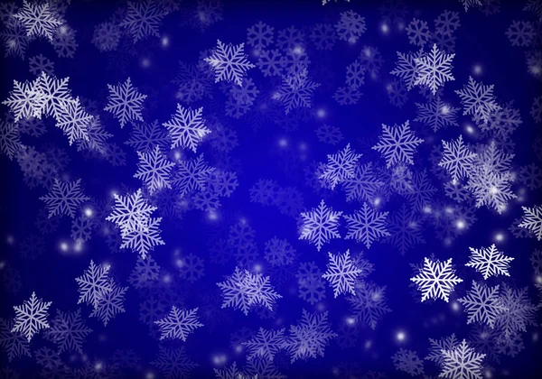 青いグラデーションの背景にクリスマスの雪片 — ストック写真