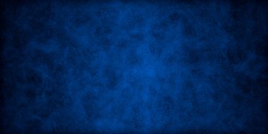 Koyu benekli mavi duvar arkaplanı.