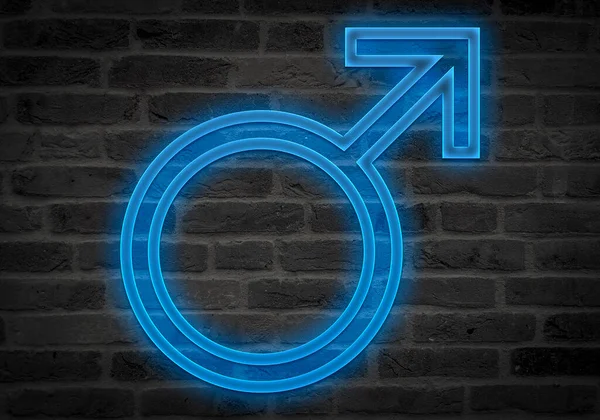 Blue neon icon of man on brick background.