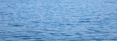 Mavi su yüzeyinin dokusu - deniz arka planı