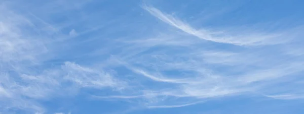 stock image blue sky with white clouds and sun light. Nature background of sky