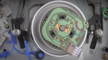 Closeup shot of parts moving inside of a vcr.
