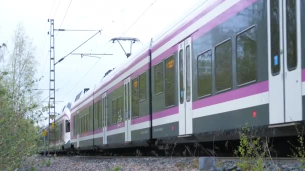 The local train in Helsinki Finland on the tracks — стокове відео