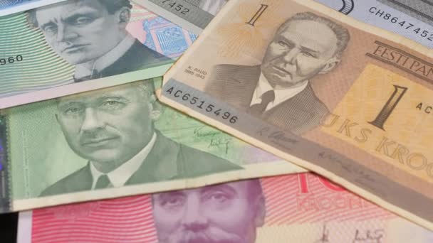 The old Estonian Kroon money bills on the table.close-up.4K UHD — стоковое видео