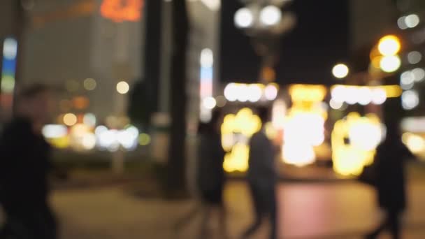 Japonya 'da Nagoya sokaklarının bulanık, ışıl ışıl bokeh etkisi. — Stok video