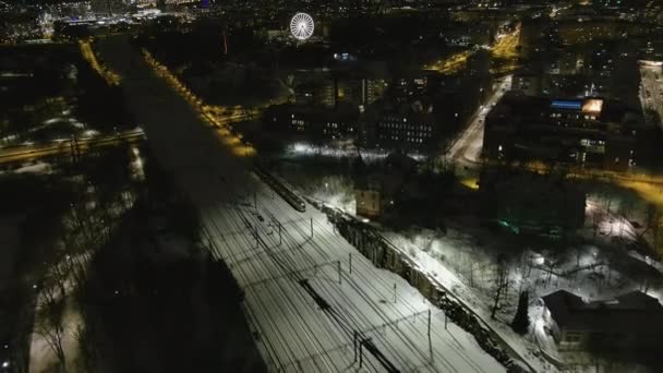 Aerial shot of a train driving in the downtown of Helsinki Finland. — Stock Video