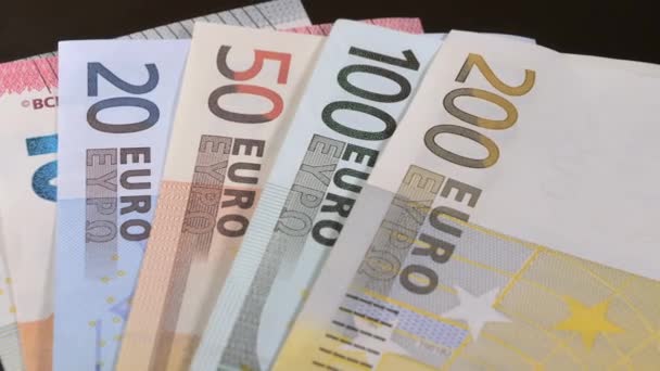 Diferentes valores de los billetes de papel Euro .close-up.4K UHD — Vídeos de Stock