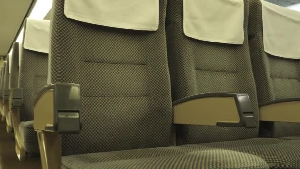 Closeup shot of seats inside a vintage train wagon. — Stok video