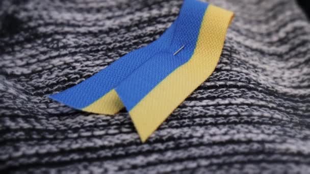 Closeup Shot Ukrainian Symbol Attached Cloth Black White Blue Yellow — Stockvideo