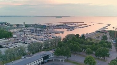 Tallinn.Estonia-July 5.2021: Beautiful aerial shot of the Pirita marina in Tallinn Estonia. Awesome seaside view and architecture. Drone slowly moving forward.