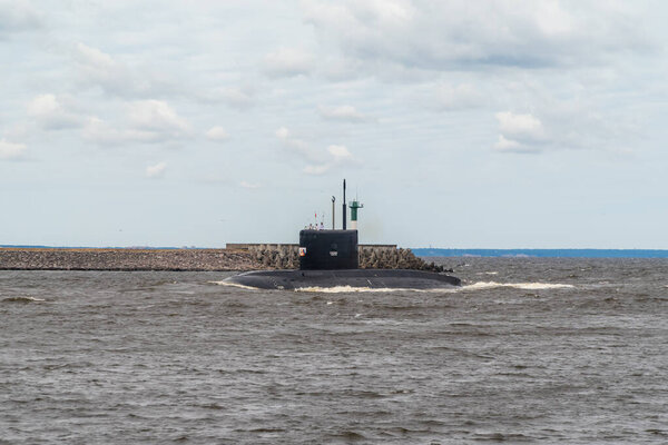 Russia. July 25, 2021. Navy Day celebration. The Petropavlovsk-Kamchatsky diesel-electric submarine of Project 636 runs along the fairway along the southern coast of Kronstadt.